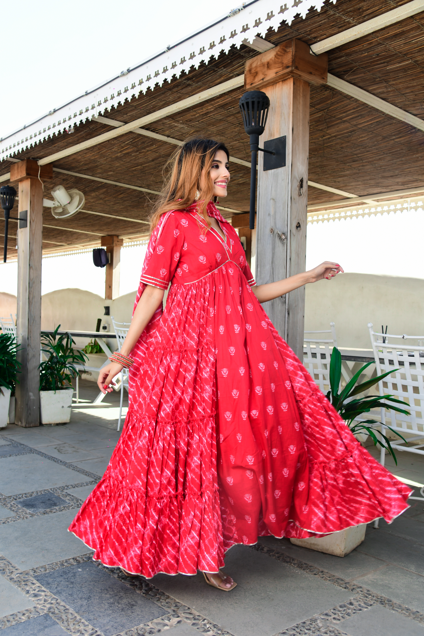 Red tiered kurta set and Multicolored tiered set